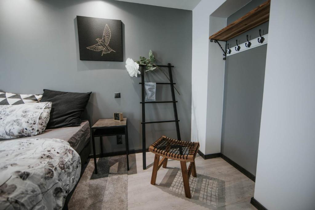 Voodi või voodid majutusasutuse Pinska Guesthouse Cozy Apartment toas