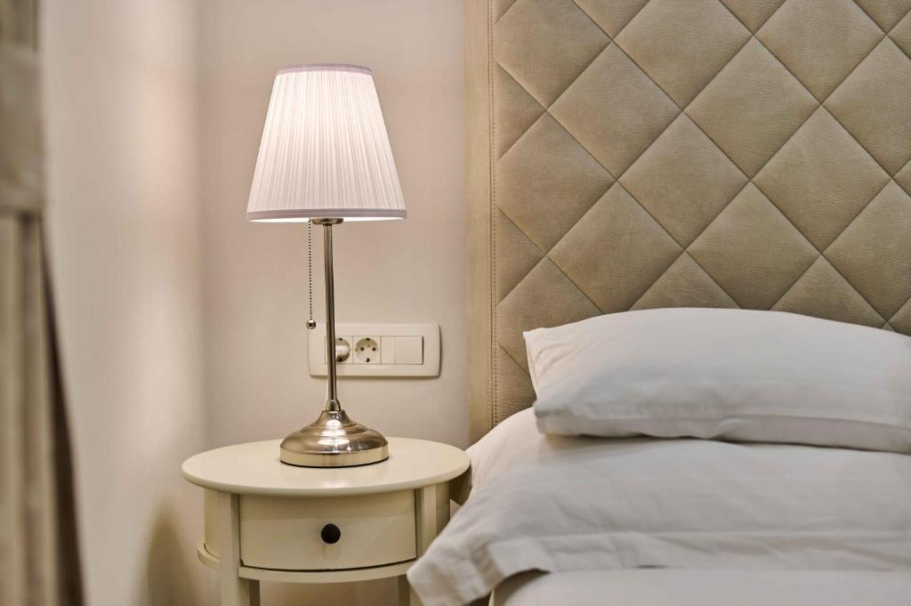 Postel nebo postele na pokoji v ubytování Best location Rooms