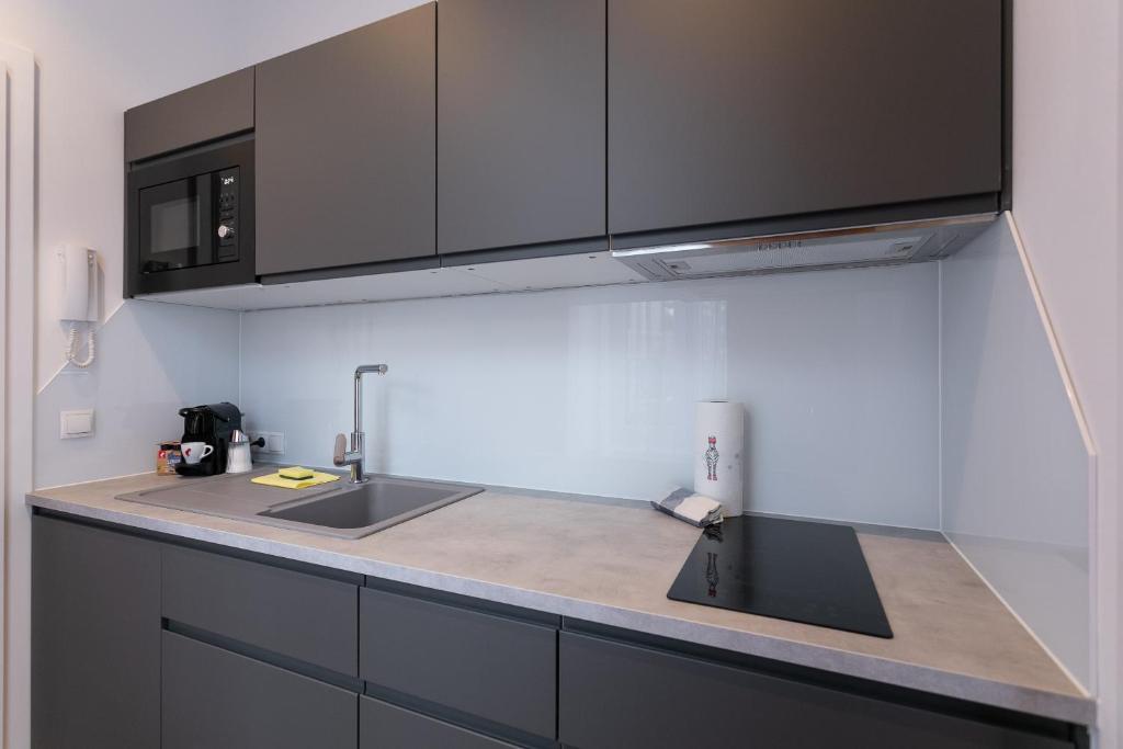 Kuchyň nebo kuchyňský kout v ubytování WF-Apartment Westbahnhof