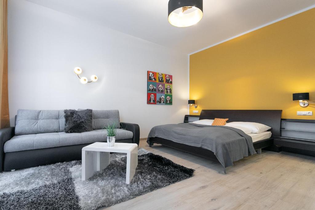 En eller flere senger på et rom på WF-Apartment zentral, trendig & modern, Westbahnhof