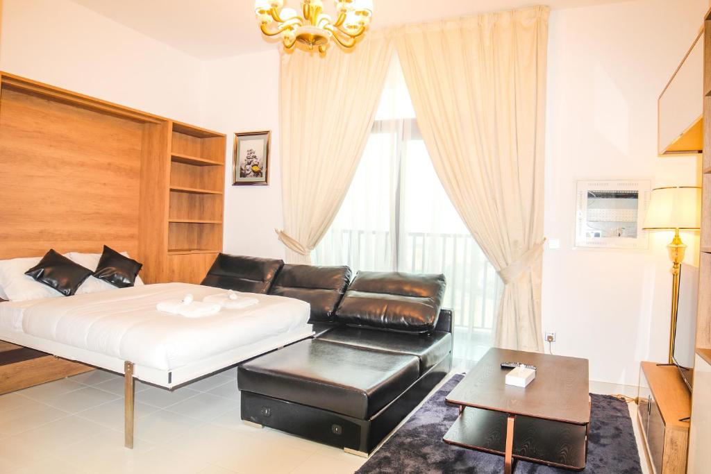 Signature Holiday Homes - Fully Furnished Studio in Glamz, Al Furjan, Dubai, UAE - Booking.com