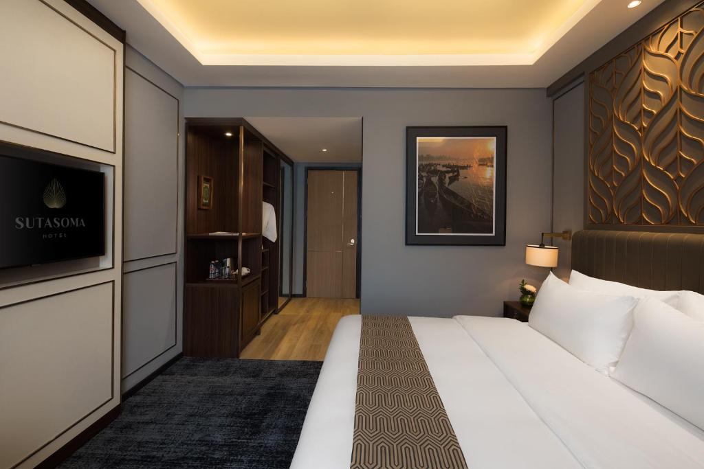 Katil atau katil-katil dalam bilik di Sutasoma Hotel