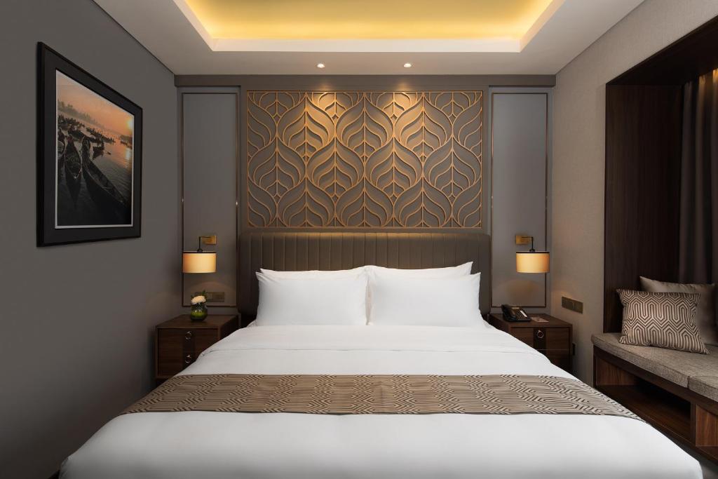 Katil atau katil-katil dalam bilik di Sutasoma Hotel