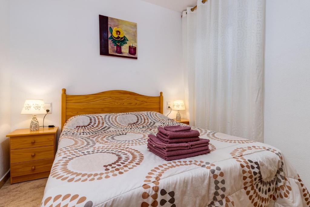 Postel nebo postele na pokoji v ubytování Caballero Apartment