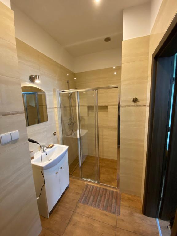 Kúpeľňa v ubytovaní Dom Nad Brennica Pokoje i Apartamenty