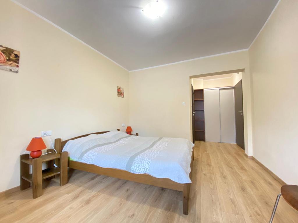 Posteľ alebo postele v izbe v ubytovaní Dom Nad Brennica Pokoje i Apartamenty