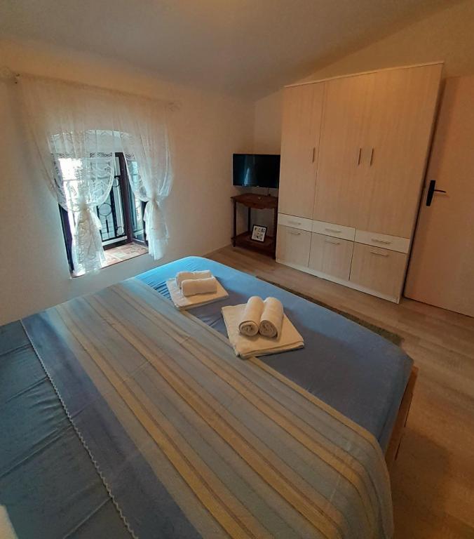 En eller flere senger på et rom på BellaVistaZmukic Guesthouse