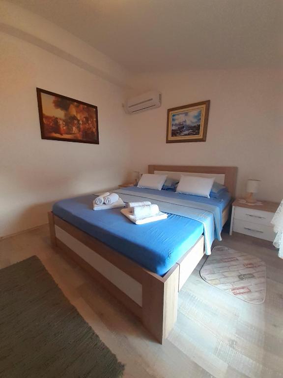 En eller flere senger på et rom på BellaVistaZmukic Guesthouse