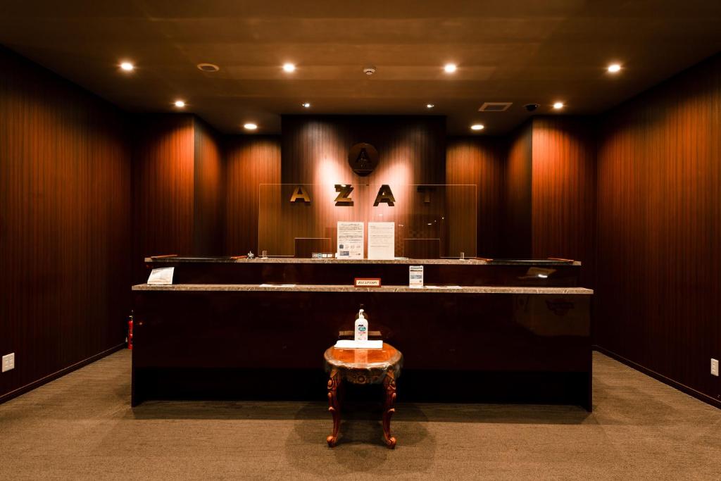 a court room with a table in the middle at Hotel Azat Naha in Naha