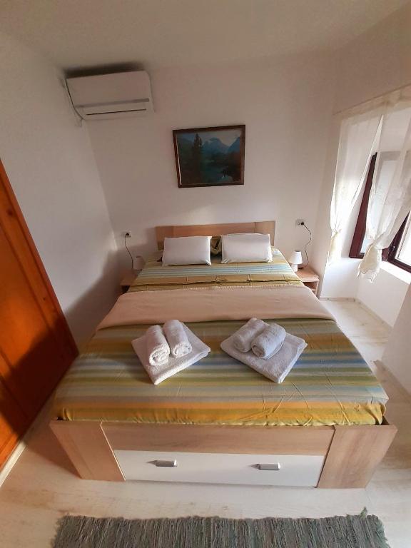 En eller flere senger på et rom på BellaVistaZmukic Guesthouse