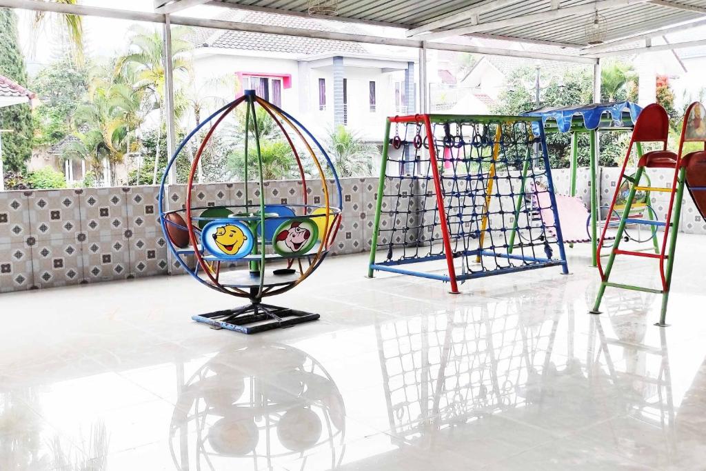 Fotografie z fotogalerie ubytování Pertiwi Homestay Near Museum Angkut Batu Mitra RedDoorz v destinaci Malang