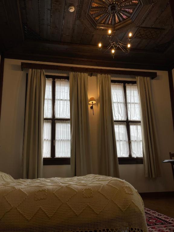 Letto o letti in una camera di Hotel Mangalemi
