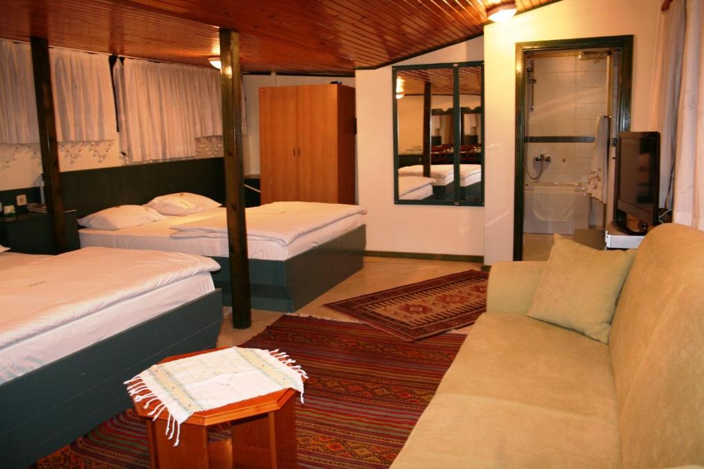 Postel nebo postele na pokoji v ubytování Hotel HAL-TUR