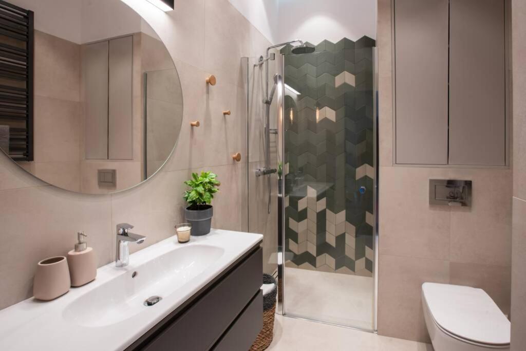 Kúpeľňa v ubytovaní Elegant Apartment Luminis in Krakow's Old City