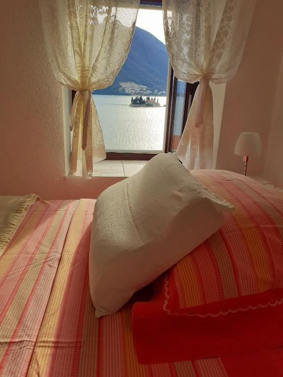 En eller flere senger på et rom på BellaVistaZmukic Guesthouse