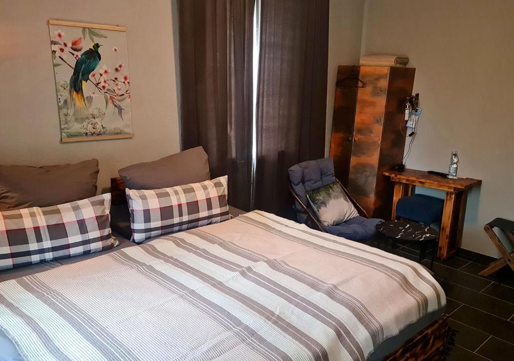 Postel nebo postele na pokoji v ubytování Hotel Geismarburg