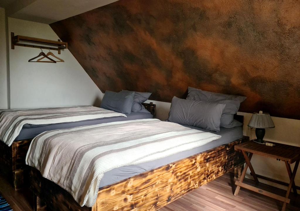 Postel nebo postele na pokoji v ubytování Hotel Geismarburg
