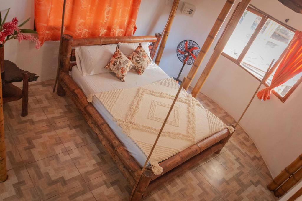 Postel nebo postele na pokoji v ubytování Kanta Sana