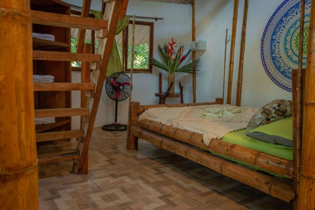 Postel nebo postele na pokoji v ubytování Kanta Sana