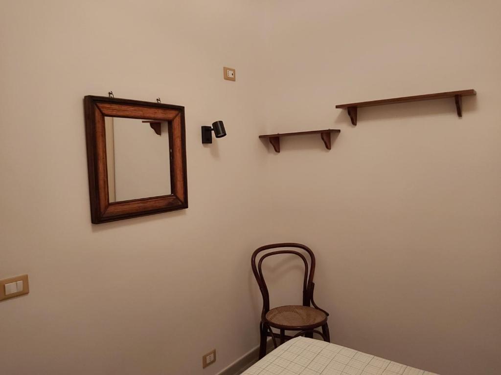 Łóżko lub łóżka w pokoju w obiekcie Le Logge Apartment