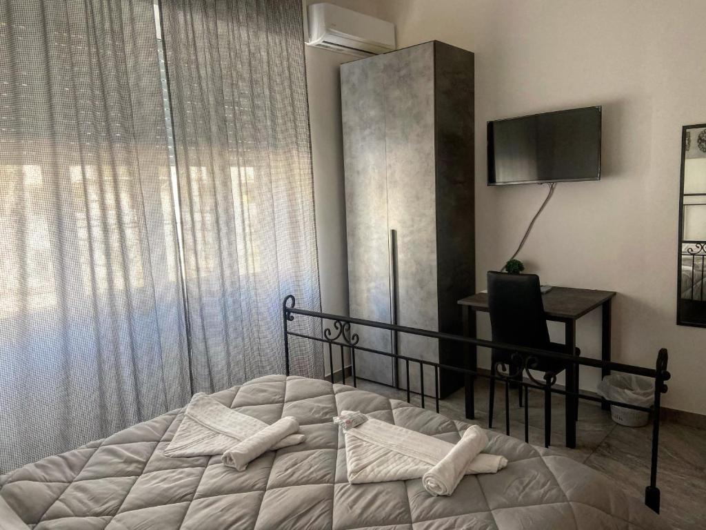 Postel nebo postele na pokoji v ubytování B&B FRONTEMARE San Salvo Marina CH