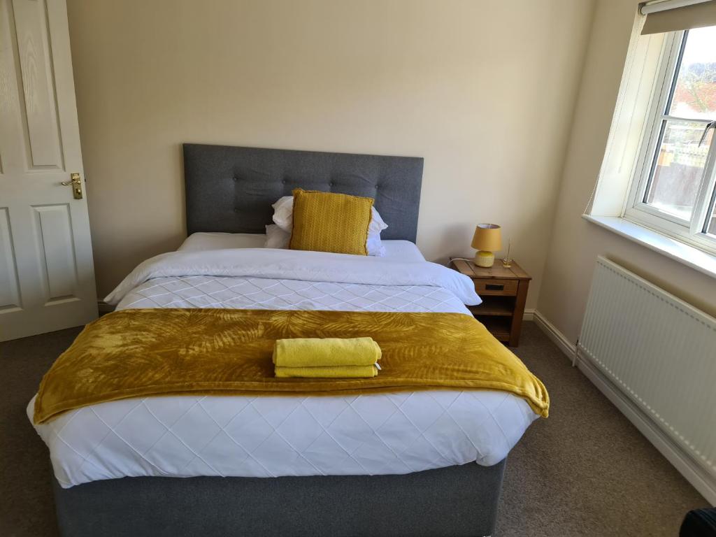 Ένα ή περισσότερα κρεβάτια σε δωμάτιο στο Bougainville House- Accommodation for up to six guests
