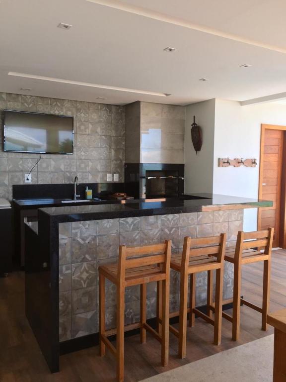  Linda casa com vista para o mar em condomínio fechado