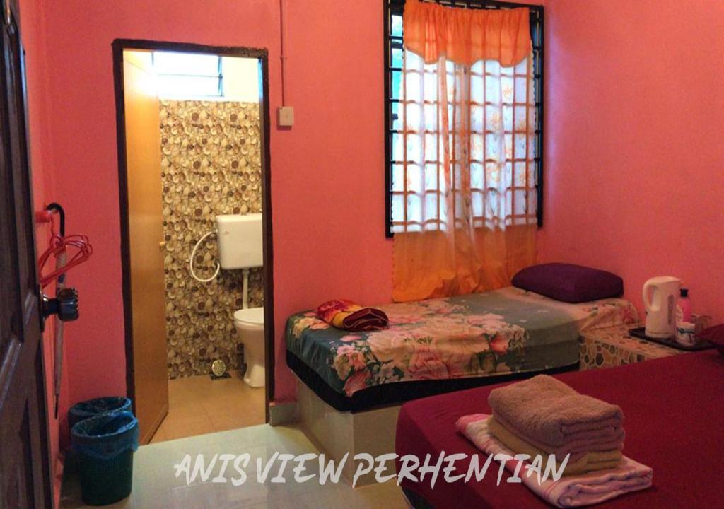 Postel nebo postele na pokoji v ubytování Anis View Perhentian