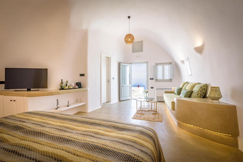 Telewizja i/lub zestaw kina domowego w obiekcie Siete Mares Luxury Suites