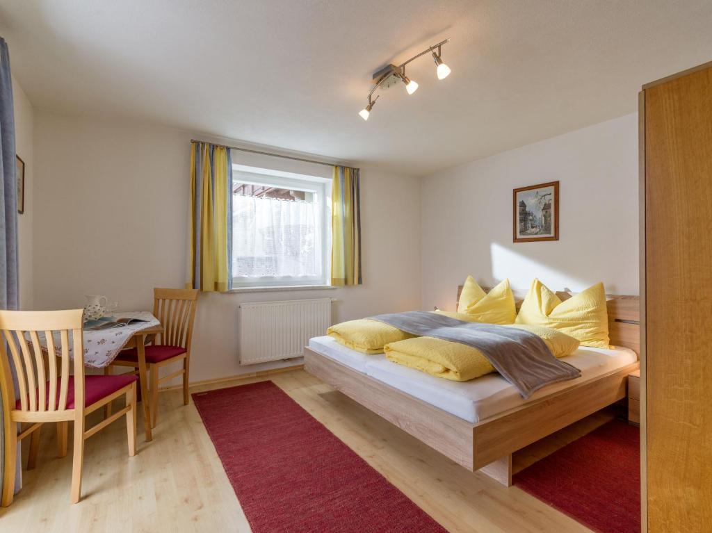 Postel nebo postele na pokoji v ubytování Haus Talblick