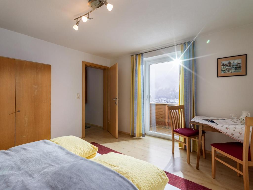Postel nebo postele na pokoji v ubytování Haus Talblick