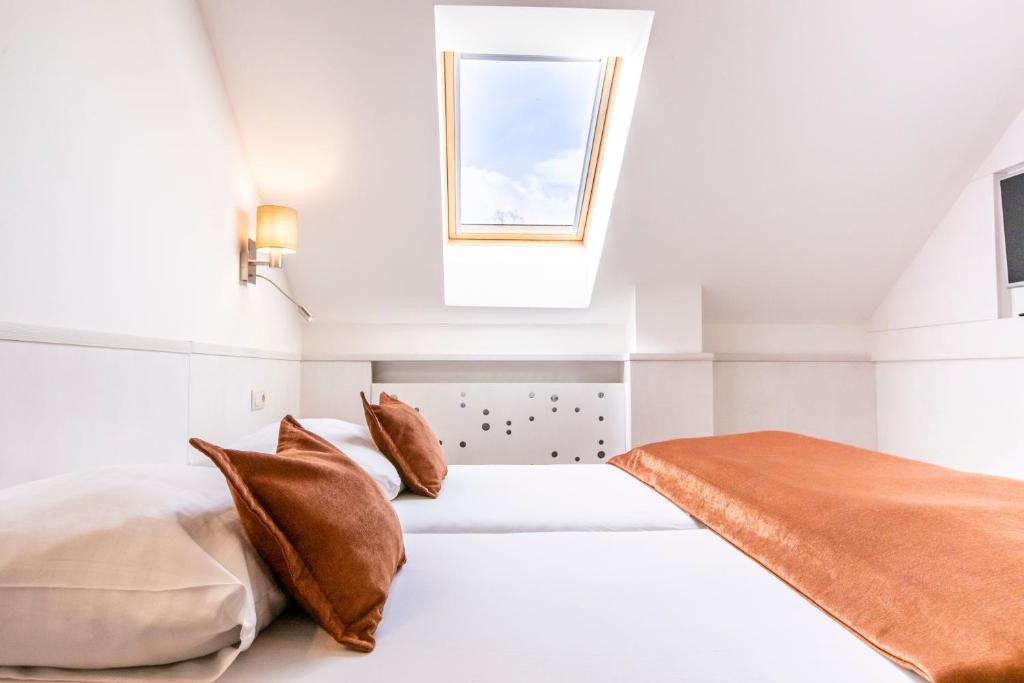 Postel nebo postele na pokoji v ubytování Hotel Olberg