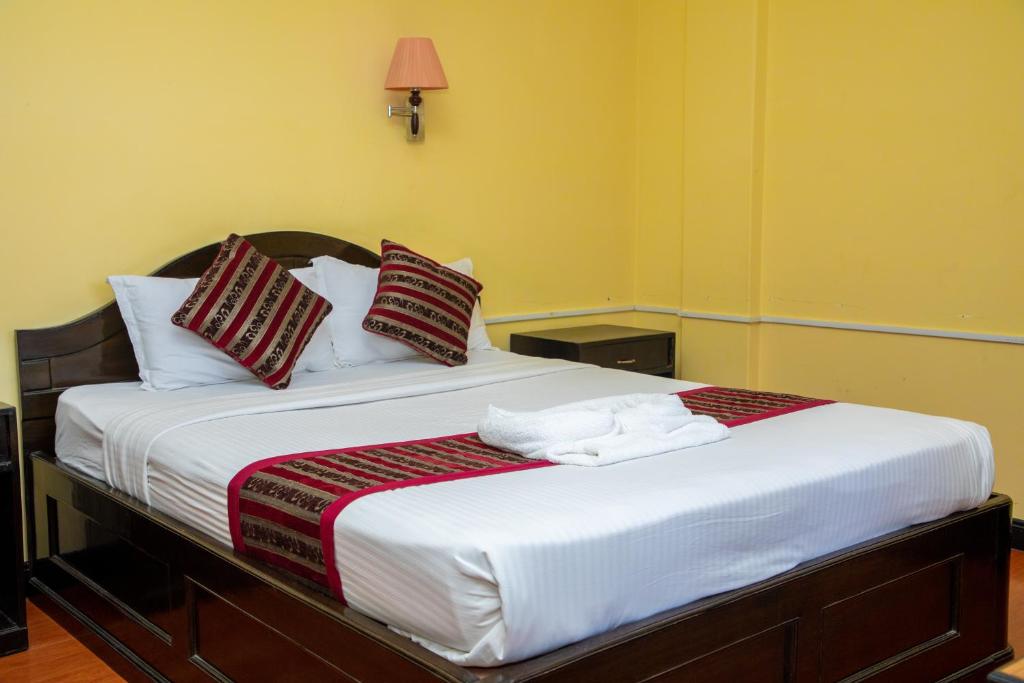 Katil atau katil-katil dalam bilik di Hotel Bougainvillea