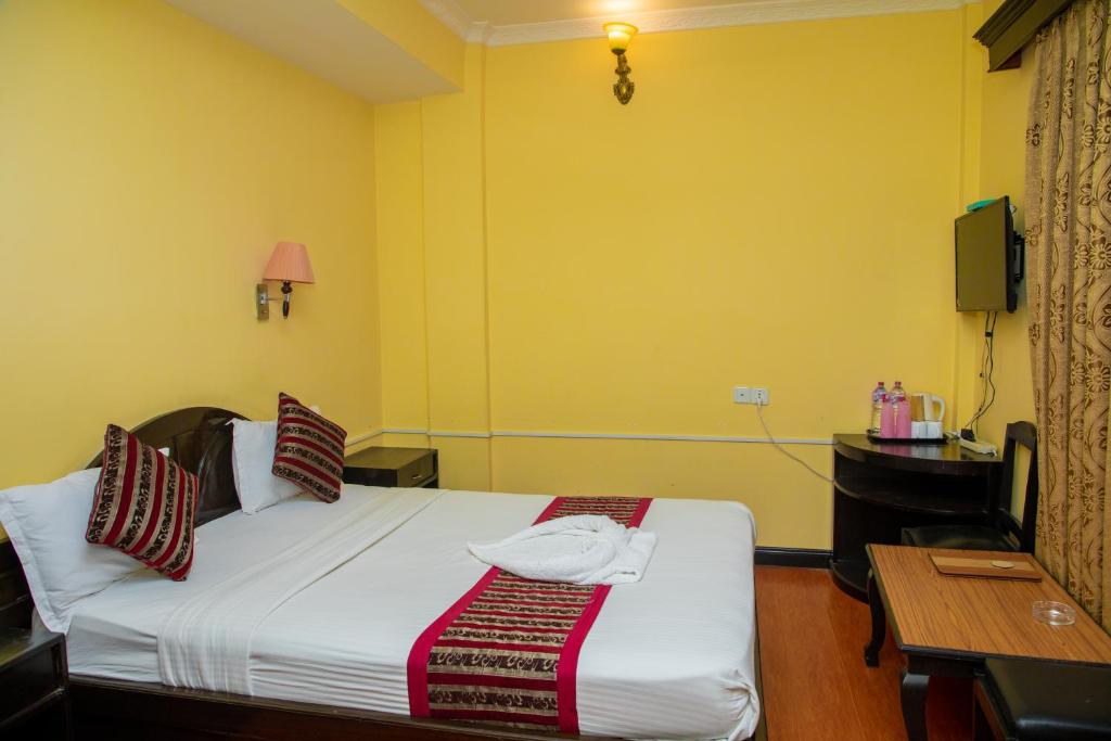 Katil atau katil-katil dalam bilik di Hotel Bougainvillea