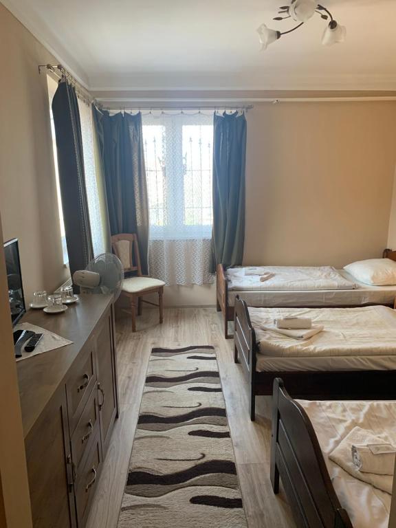 Postel nebo postele na pokoji v ubytování Aranykorona Hotel