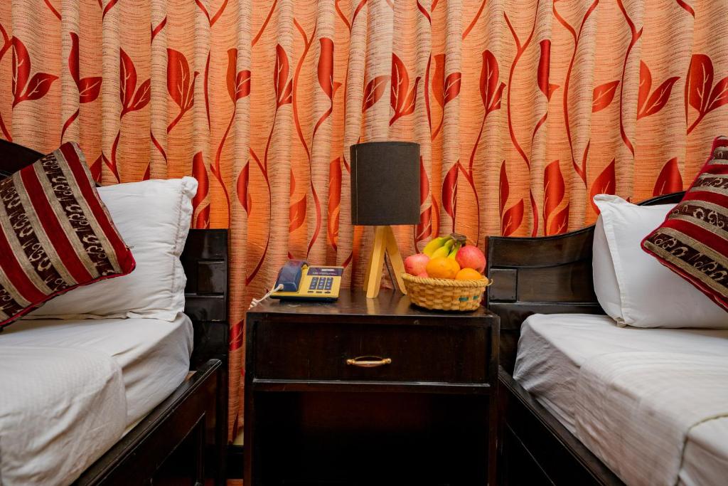 Katil atau katil-katil dalam bilik di Hotel Bougainvillea