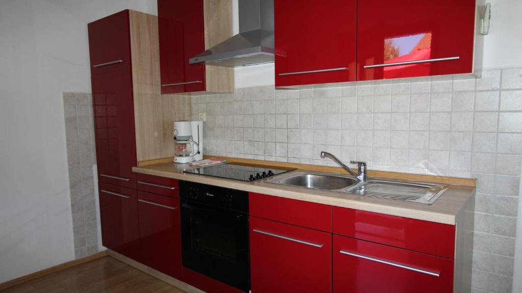 Kuchyň nebo kuchyňský kout v ubytování Apartments Gržetić