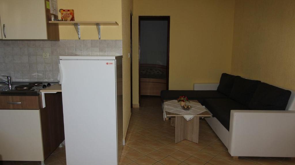 Kuchyň nebo kuchyňský kout v ubytování Apartments Gržetić