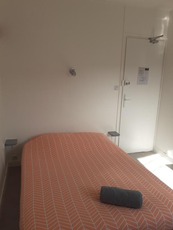 Postel nebo postele na pokoji v ubytování Relais Maximilien