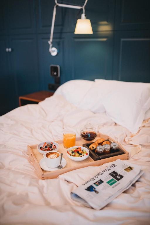Ένα ή περισσότερα κρεβάτια σε δωμάτιο στο The Bold Type Hotel, a Member of Design Hotels