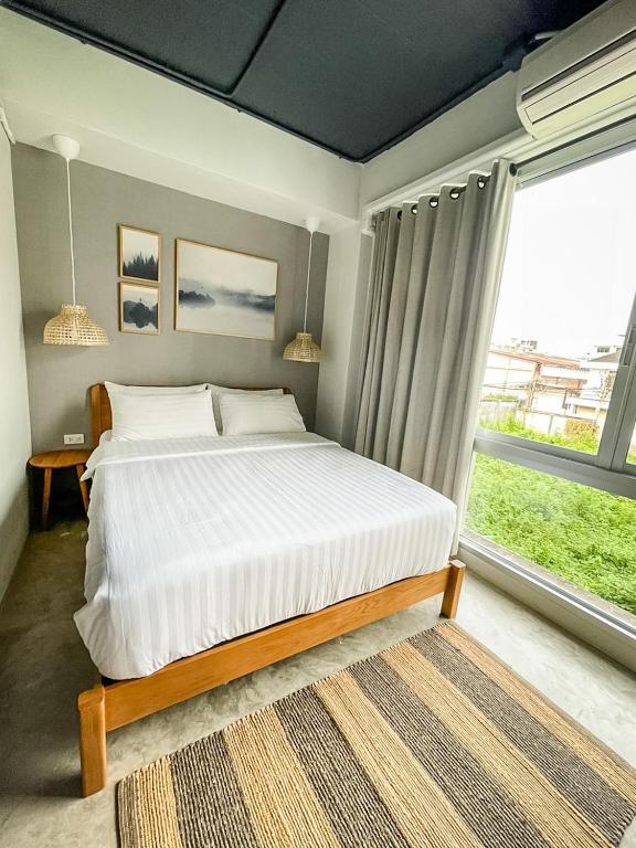 Postel nebo postele na pokoji v ubytování Bedgasm Hostel Chanthaburi