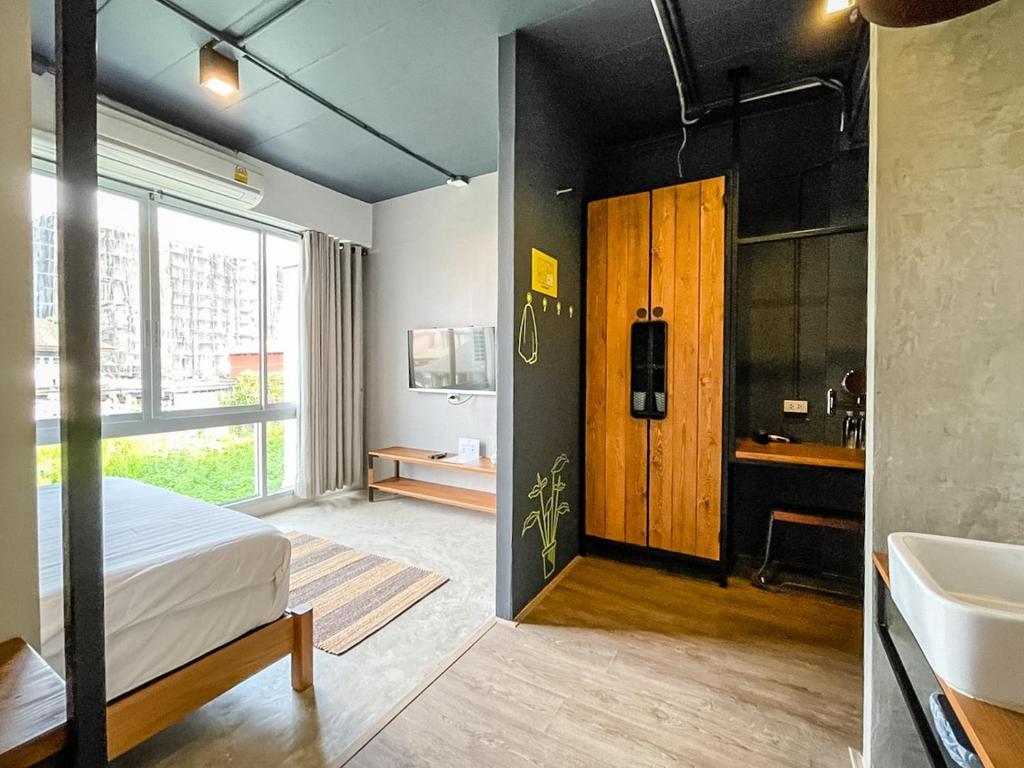 Postel nebo postele na pokoji v ubytování Bedgasm Hostel Chanthaburi