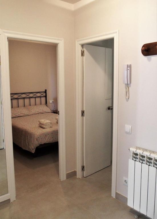 Posteľ alebo postele v izbe v ubytovaní apartament dúplex "Alsina"