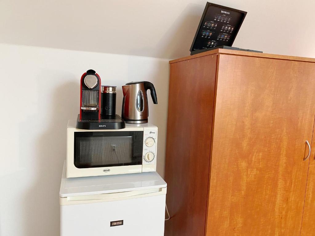 Kuchyň nebo kuchyňský kout v ubytování Apartmán Karlovice