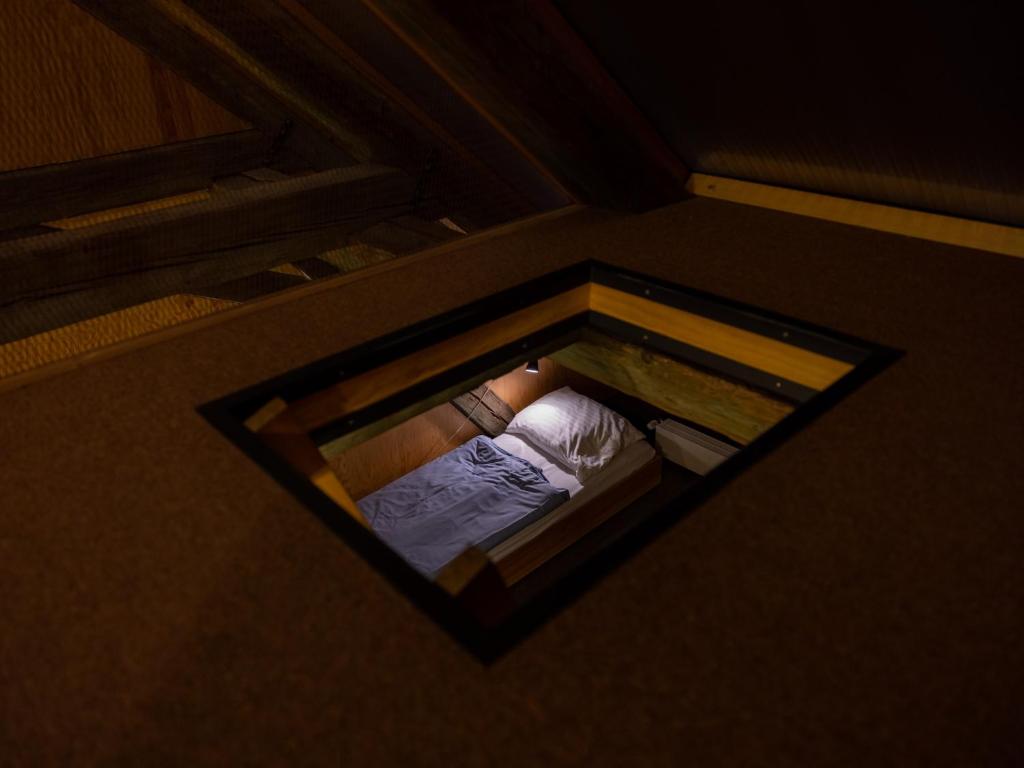 Postel nebo postele na pokoji v ubytování Zámecký Hostel Litomyšl