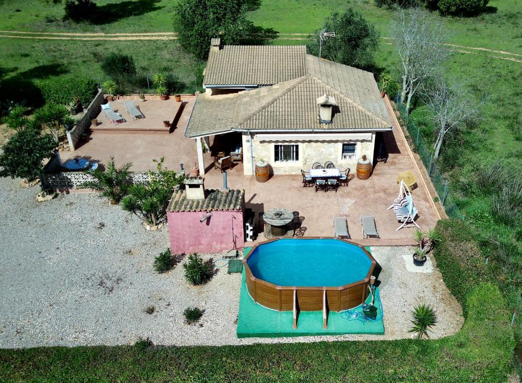 an aerial view of a house with a swimming pool at Finca Can Titos in Llucmajor