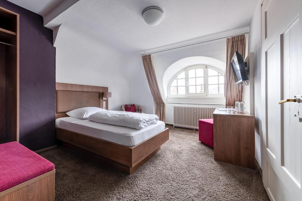 Postel nebo postele na pokoji v ubytování Boutique Hotel Societe