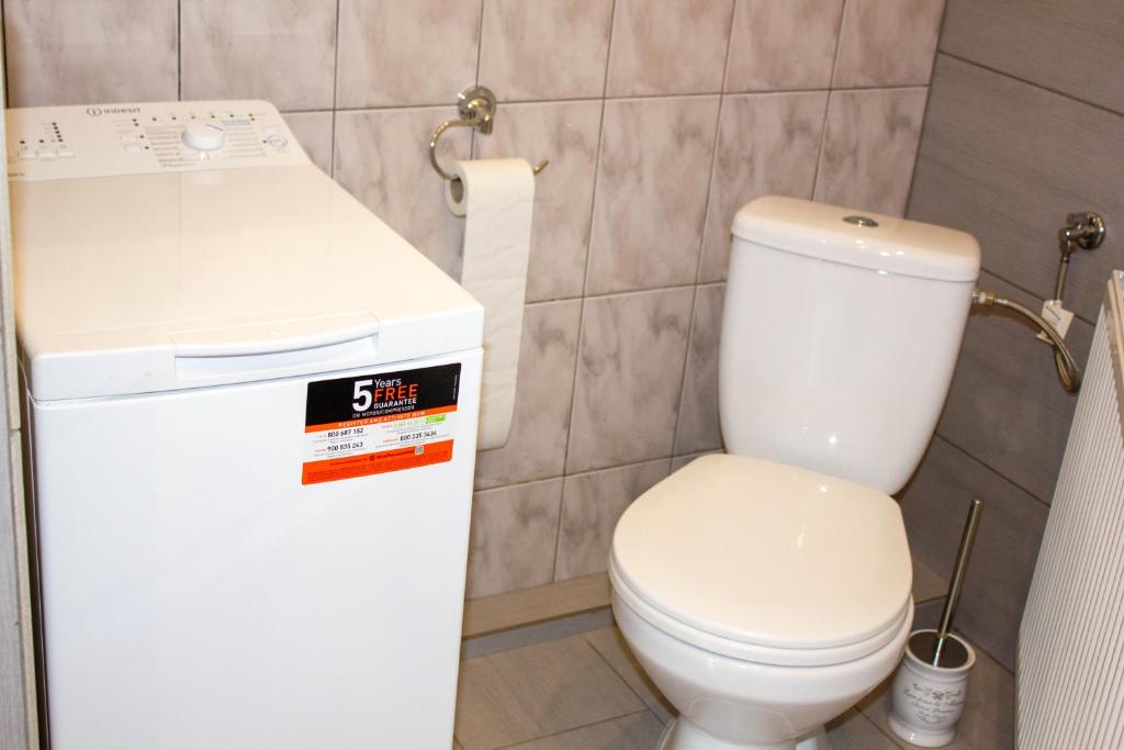 Kúpeľňa v ubytovaní Szkocka 4 Apartamenty