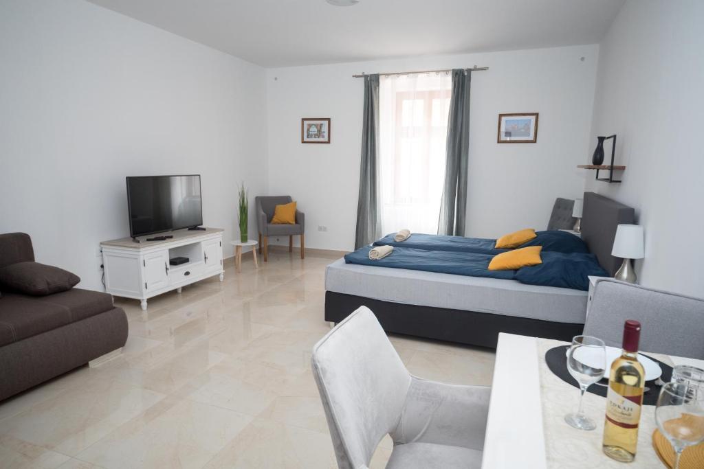 Posezení v ubytování Kossuth Apartmanház