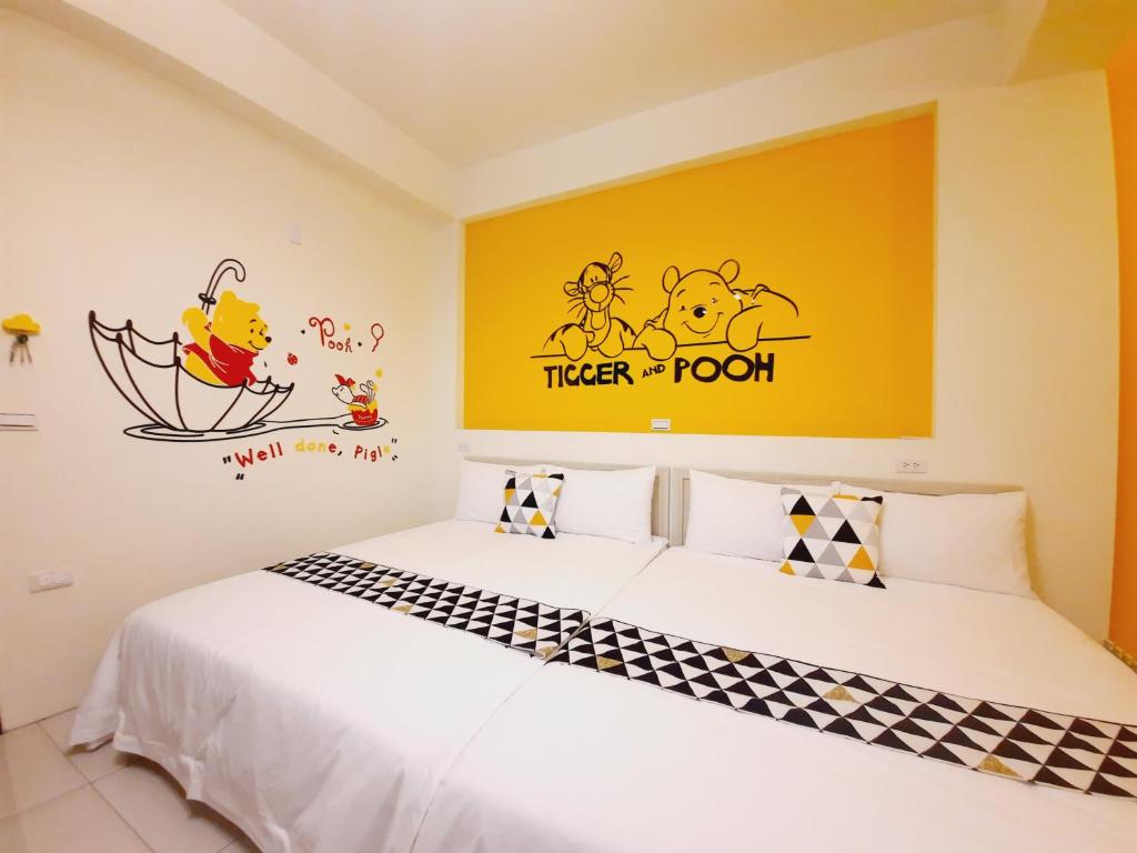 Postel nebo postele na pokoji v ubytování 3Kiss Homestay